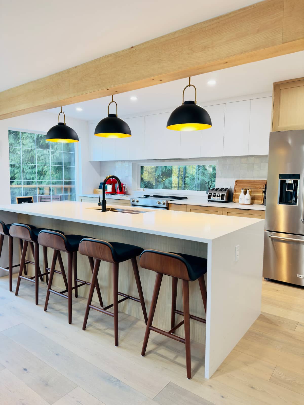 Bright full kitchen with island seating